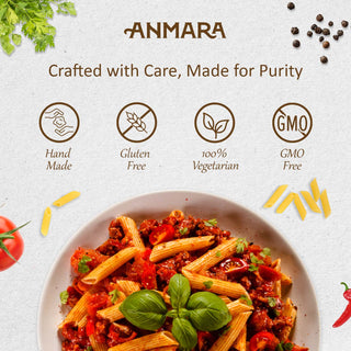 Pasta dish with basil leaves on a light background, featuring the brand 'ANMARA' and their product attributes.